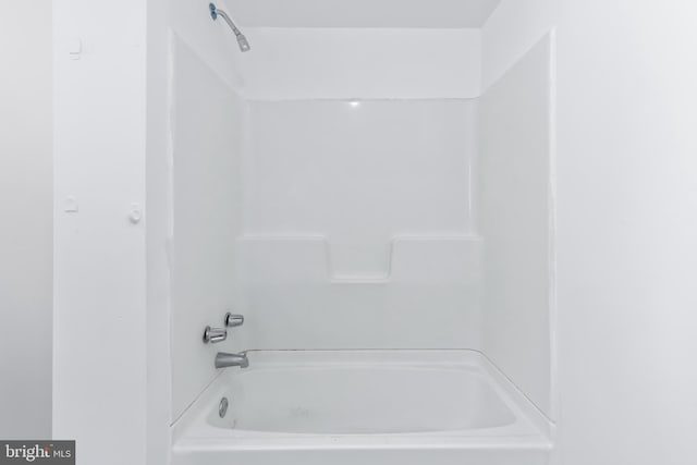 bathroom with shower / bath combination