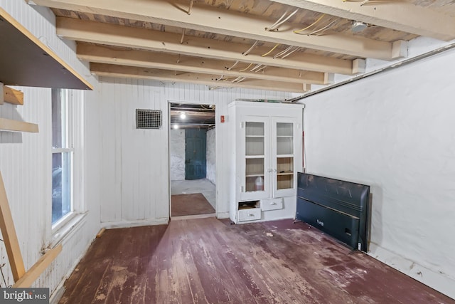 interior space with dark hardwood / wood-style floors