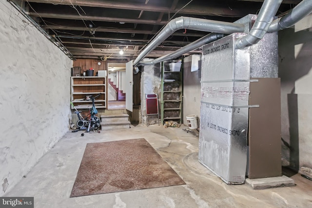 basement featuring heating unit