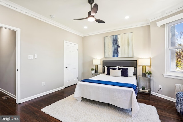 bedroom featuring ceiling fan, crown molding, and dark hardwood / wood-style floors