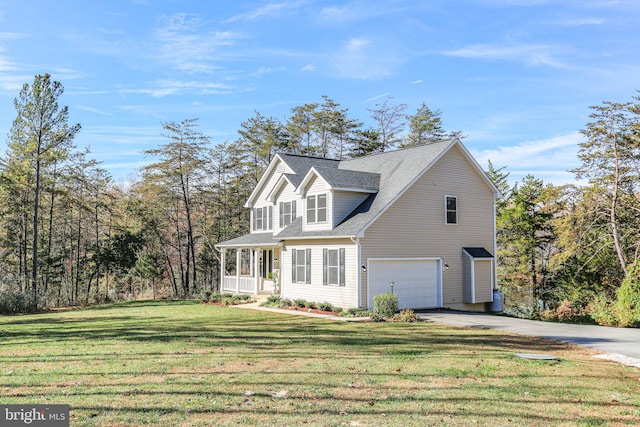 view of front facade featuring a garage and a front yard