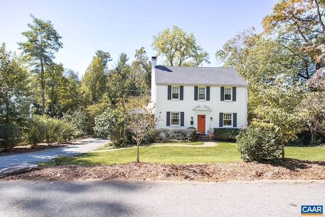 view of front of home with a front yard