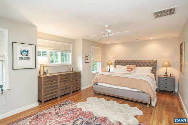 bedroom featuring hardwood / wood-style flooring and ceiling fan