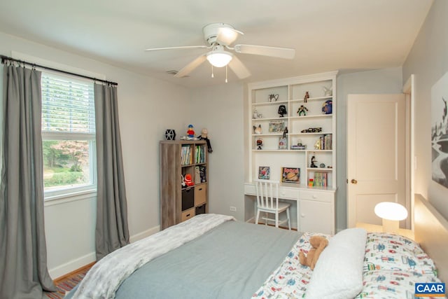 bedroom featuring wood-type flooring and ceiling fan