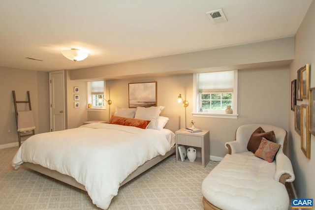 bedroom with light carpet