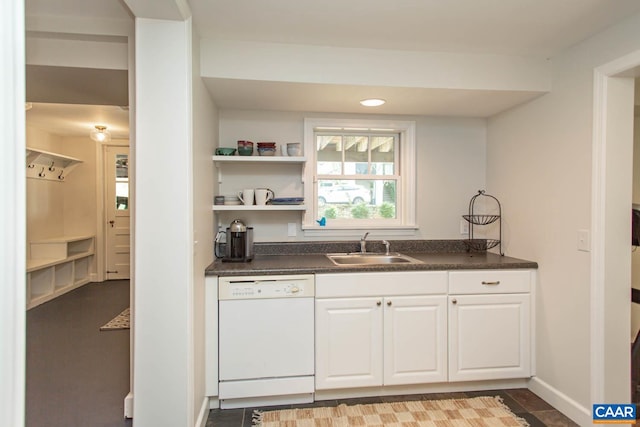 bar with white cabinets, sink, and white dishwasher