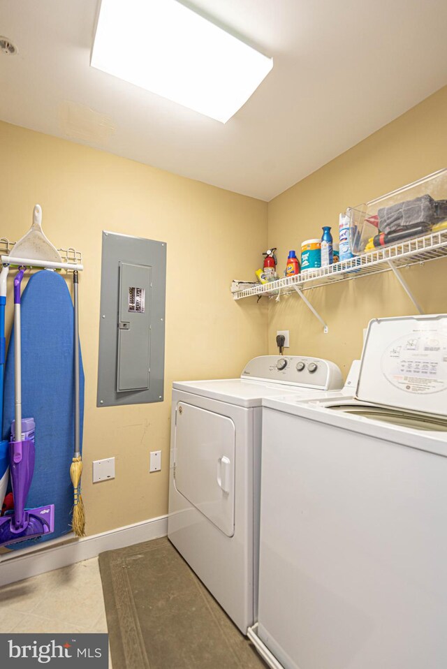 laundry room featuring independent washer and dryer and electric panel