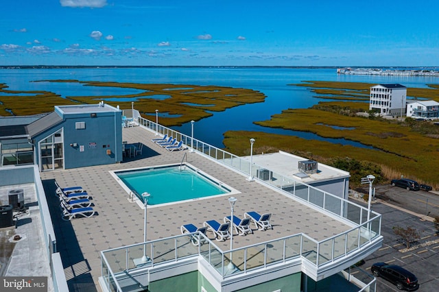 drone / aerial view with a water view