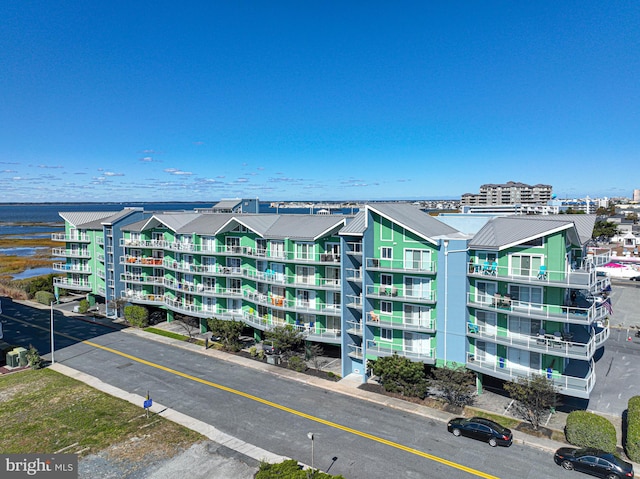 view of building exterior featuring a water view