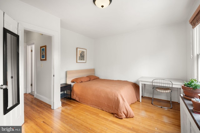 bedroom featuring light hardwood / wood-style flooring