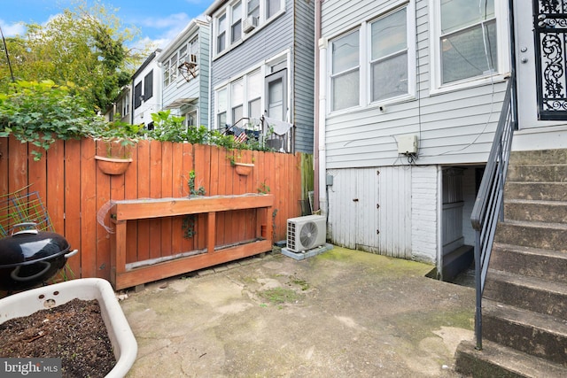 view of patio with ac unit