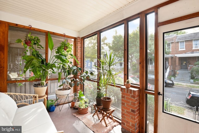 sunroom with plenty of natural light