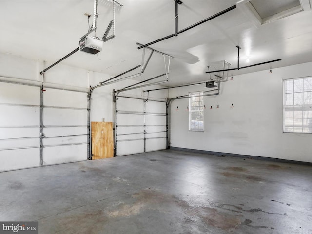 garage featuring a garage door opener