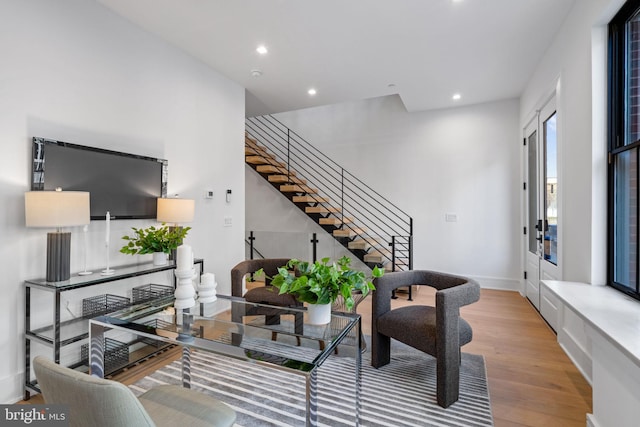 living room with light hardwood / wood-style flooring