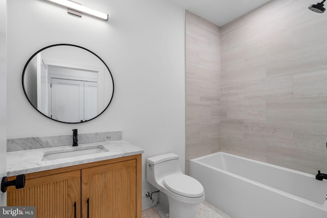 full bathroom featuring vanity, toilet, tile patterned floors, and tiled shower / bath