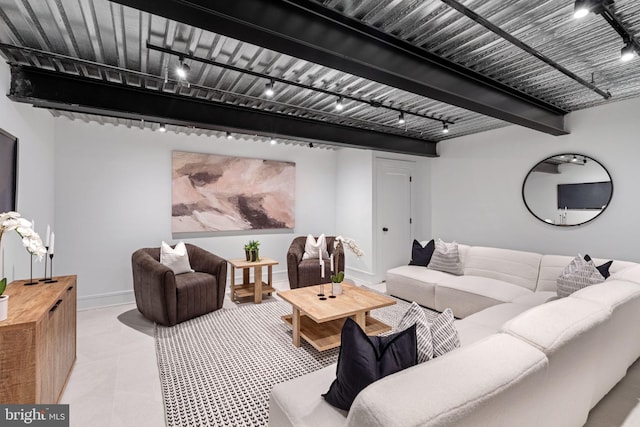 living room featuring beamed ceiling