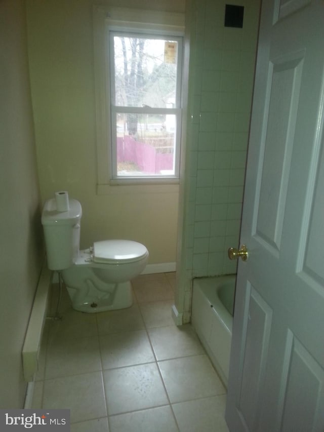 bathroom featuring toilet, separate shower and tub, and tile patterned flooring