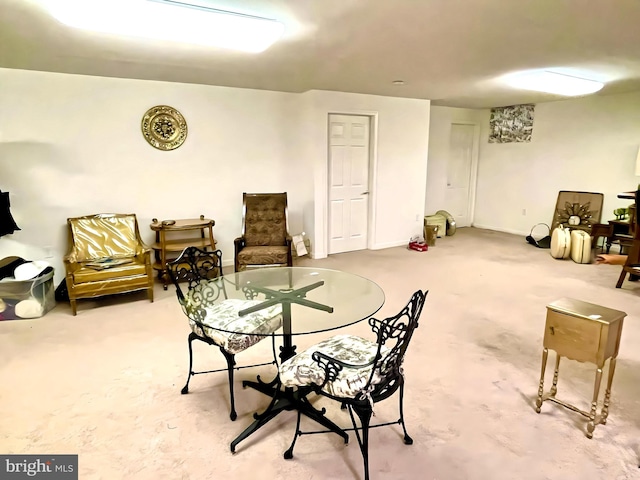 living area with carpet floors