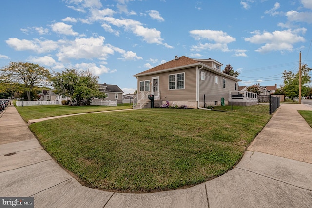 view of front facade with a front yard