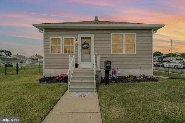 manufactured / mobile home with a lawn