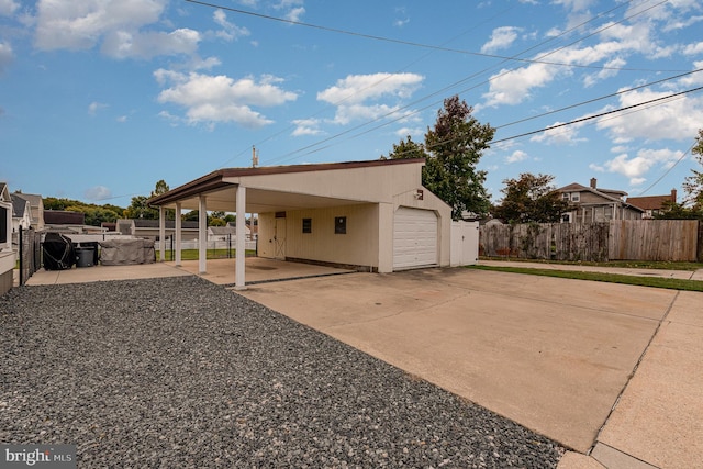 exterior space featuring a carport