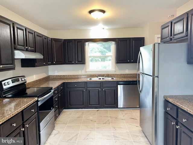 kitchen with sink and appliances with stainless steel finishes