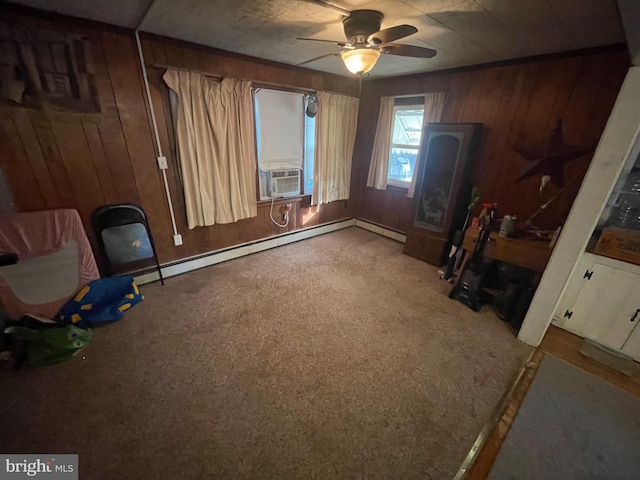 interior space with cooling unit, baseboard heating, wooden walls, and ceiling fan