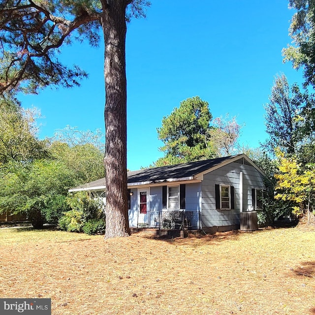 ranch-style house with central AC unit