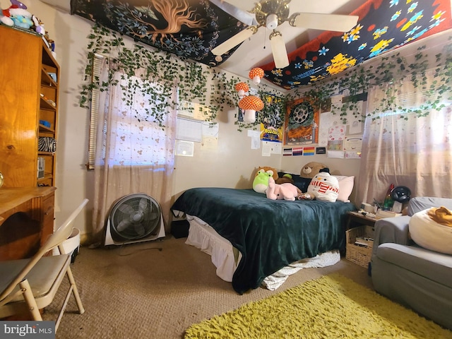 bedroom with ceiling fan and carpet