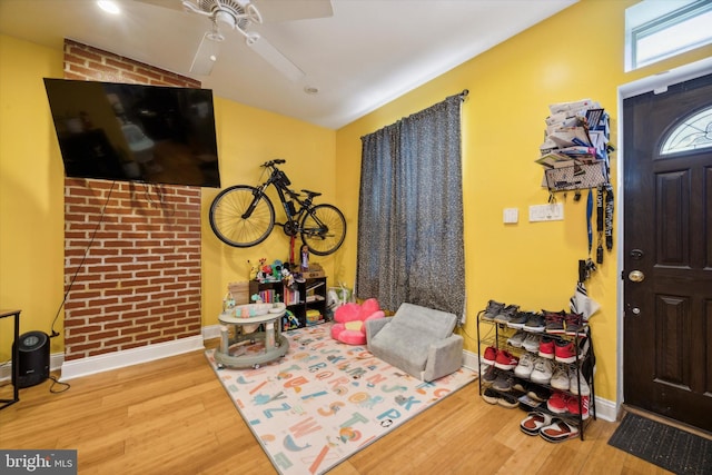 interior space featuring ceiling fan and light hardwood / wood-style flooring