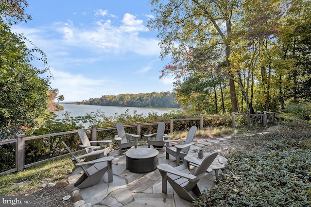 view of patio featuring a water view