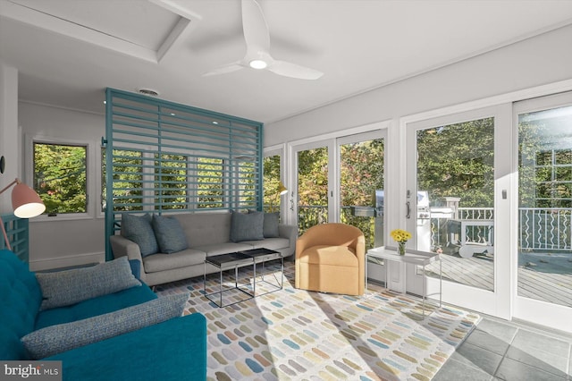 sunroom / solarium with ceiling fan