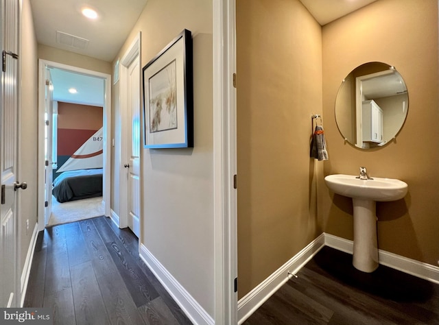 bathroom featuring hardwood / wood-style floors