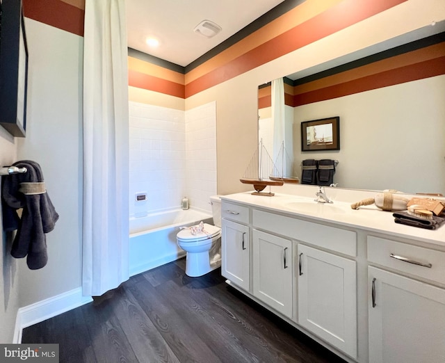 full bathroom featuring vanity, toilet, wood-type flooring, and shower / bathtub combination with curtain