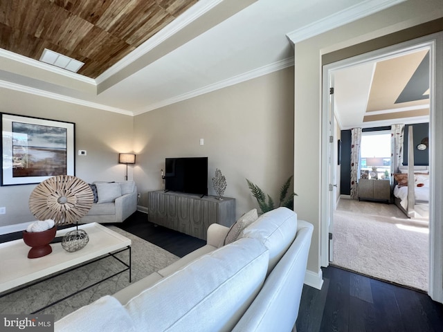 living room featuring ornamental molding, wooden ceiling, dark wood-type flooring, and a raised ceiling