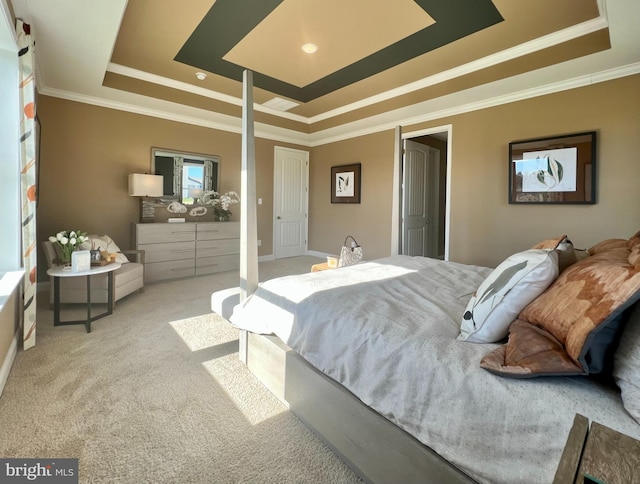 bedroom featuring light carpet, ornamental molding, and a tray ceiling