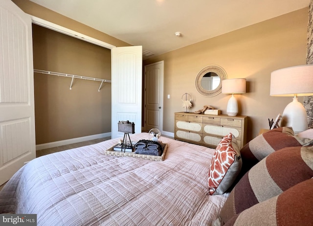 bedroom featuring a closet and carpet floors