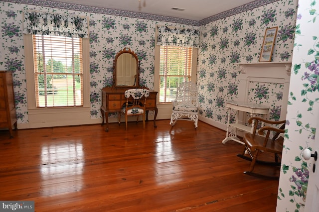 living area featuring hardwood / wood-style floors