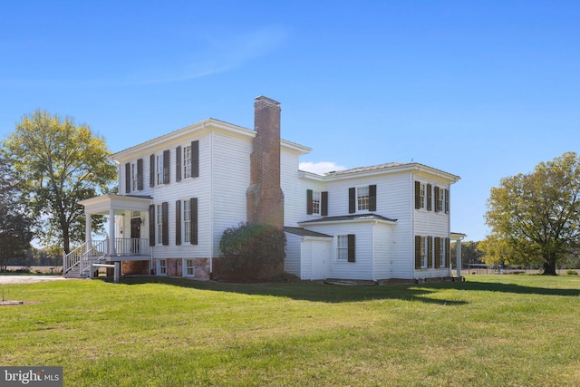 view of home's exterior featuring a lawn