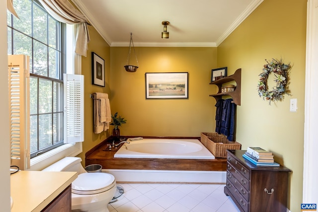 bathroom with vanity, a tub to relax in, ornamental molding, and toilet