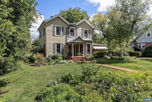 view of front facade with a front yard