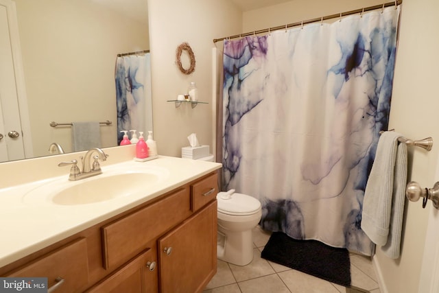 bathroom with vanity, toilet, tile patterned floors, and a shower with curtain