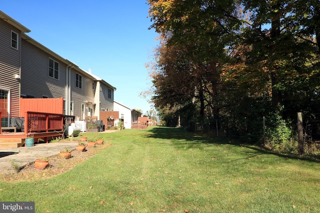 view of yard with a deck