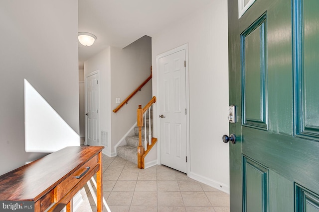 view of tiled foyer entrance