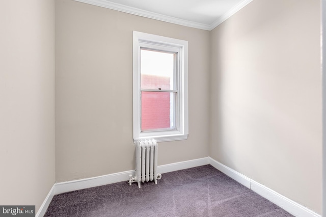 unfurnished room with ornamental molding, carpet, and radiator