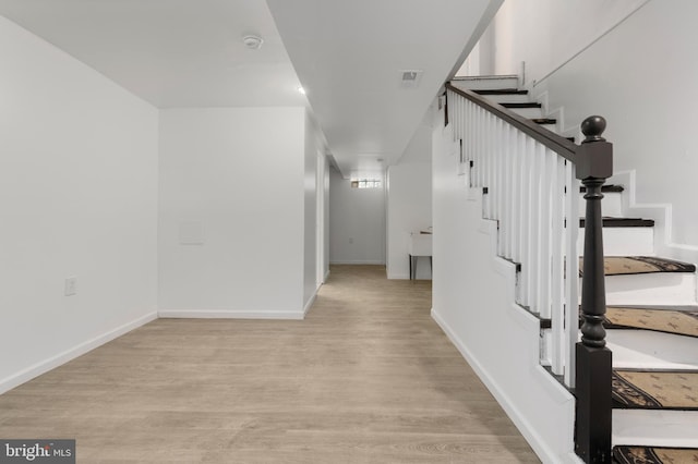 hall featuring light hardwood / wood-style floors