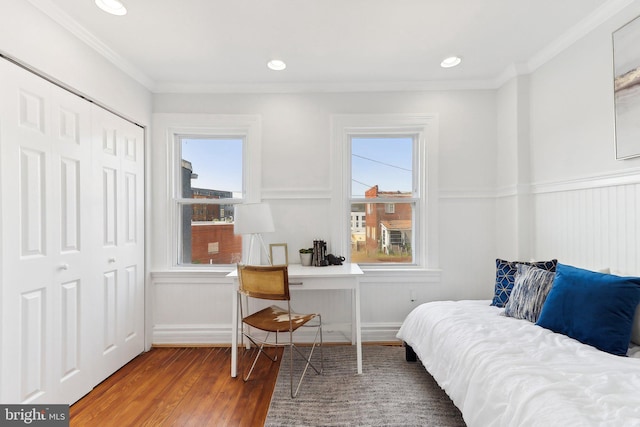 interior space with crown molding and wood-type flooring