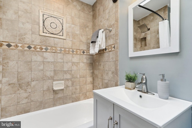 bathroom with vanity and shower / bath combo