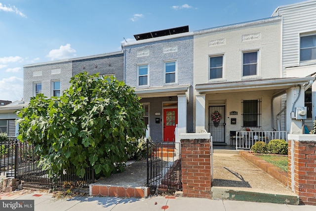 view of property with a porch