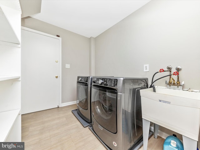 laundry area with washing machine and dryer